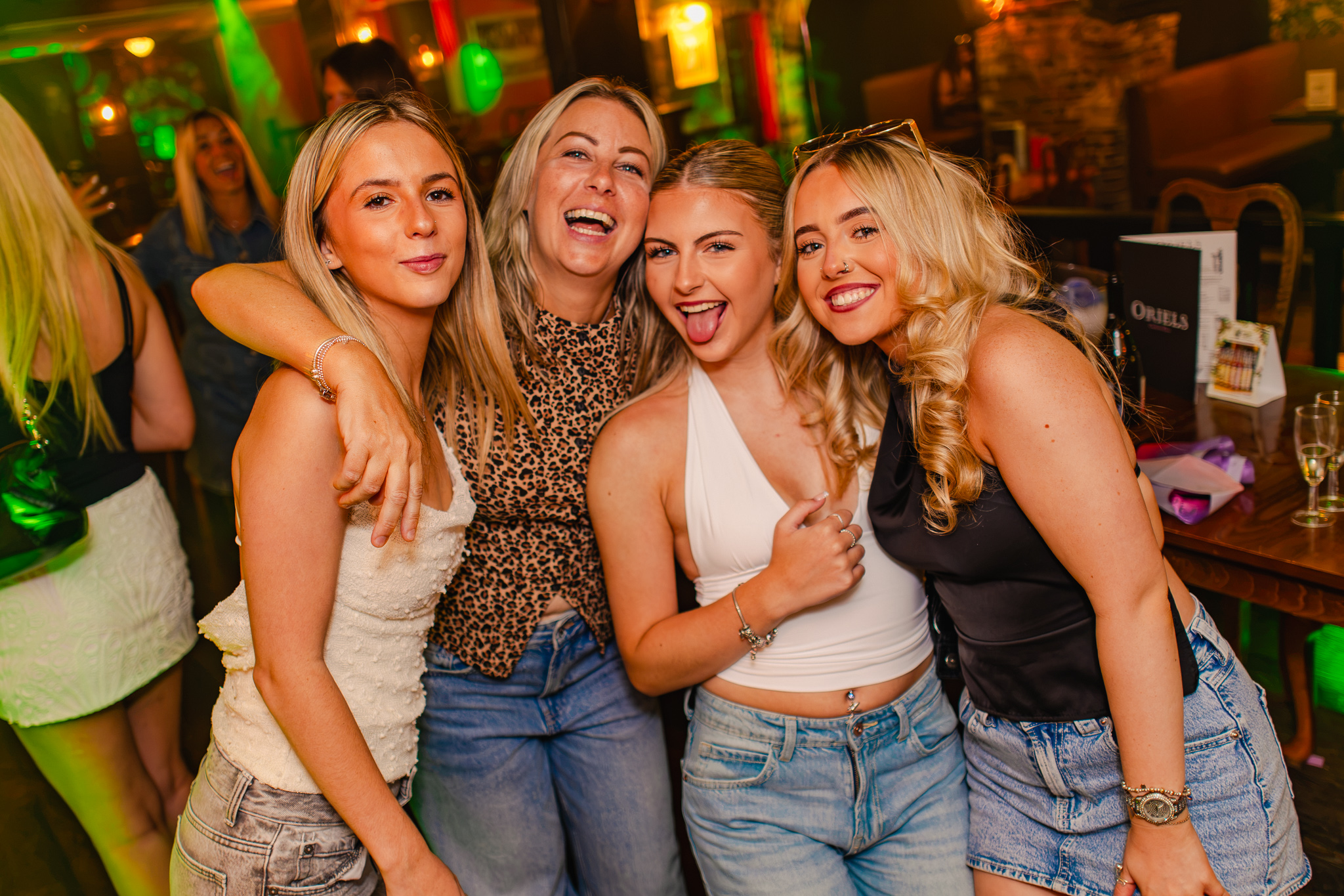 Friends enjoying a night out at Oriels Exeter